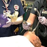 students practicing respiratory therapy techniques 
